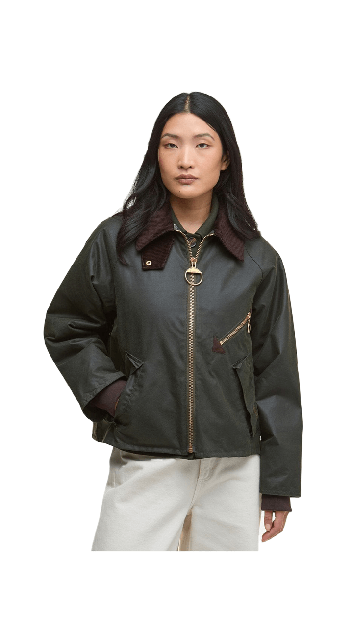 Barbour Arlene Wax Jacket on model featuring waxed fabric and corduroy collar for stylish weather protection.