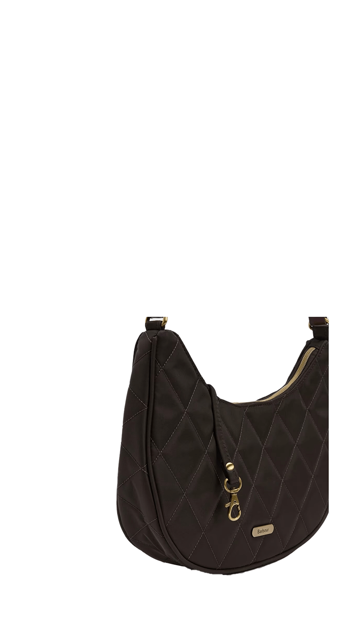 Barbour quilted sling shoulder bag in black, featuring an adjustable strap and textured design.